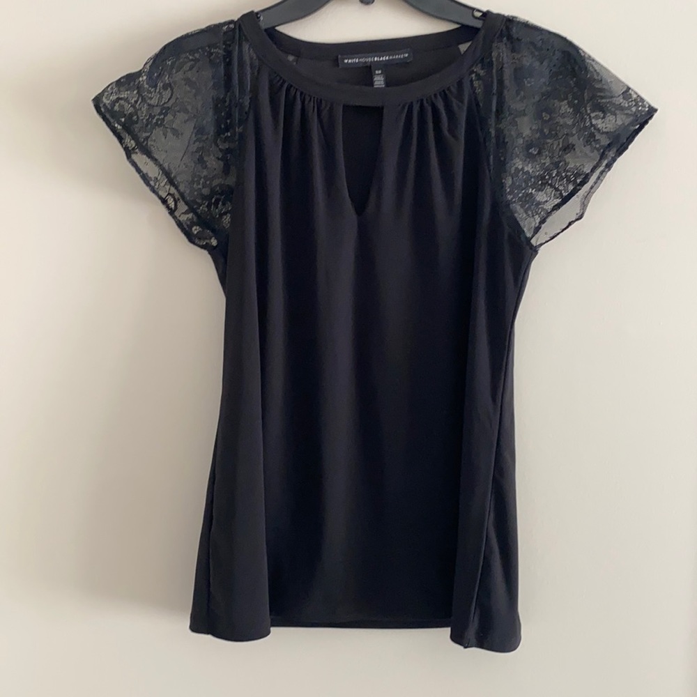 White House Black Market top with lace sleeves.
